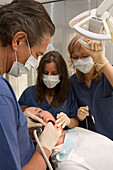 dental treatment, dentist, dental assistants, face masks, equipment, MR