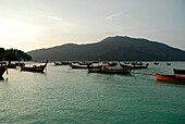 Boats in front of beach near village, Ko Lipe, Satun, Thailand