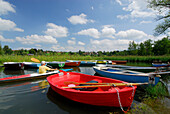 kayaker between boats at lake Staffelsee, Upper Bavaria, Bavaria, Germany