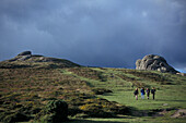 Hay Tor, group of hikers in foreground, Dartmoor, Devon, England, United Kingdom