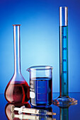 Laboratory flasks with coloured liquids