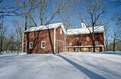 Red barn in snow. Bucks County, Pennsylvania, USA
