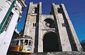 Streetcar in front of cathedral. Lisbon. Portugal