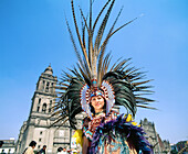 Native indian in traditional costume. Plaza de la Constitución (aka The Zócalo). Mexico City. Mexico