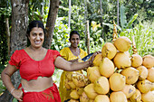 Coconuts vendor. Colombo city. Sri Lanka. April 2007.