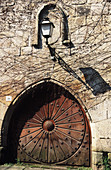 Door and façade of the Manrique medieval tower (XVth century). Cartes. Cantabria. Spain.