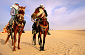 Horsemen. Sahara. Grand Erg Oriental. Tunisia
