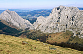 Parque Natural de Urkiola. Untzillaitz mountain on the left and Alluitz on the right. Atxarte valley. Vizcaya. Basque Country. Spain