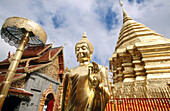 Buddha image and Wat Phra That Doi Suthep temple. Chiang Mai province. Thailand.
