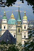 Cathedral and Franziskanerkirche at fore, Salzburg. Austria