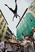 Fountain jumping during San Fermin Festival. Navarreria fountain (aka Santa Cecilia fountain). Pamplona. Navarre, Spain