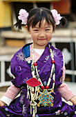 Chinese girl with Tibetan typical dress. Lhasa. Tibet. China.