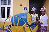 Local girls in traditional outfits. Curacao. Caribbean