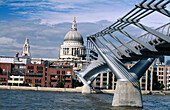 St. Paul s Cathedral and Millenium Bridge at Thames River. London. England