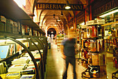 Bookshop in arcaded street. Bologna. Italy