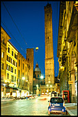 Via Rizzoli with Asinelli and Garisenda towers in background. Bologna. Italy