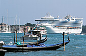 Cruise ship and gondolas. Venice. Italy