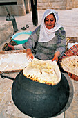 Bedouin woman making bread. Beth Gouvrin. Israel