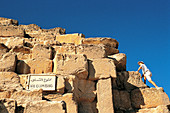 Climbing on Cheops Pyramid. Gizah. Egypt