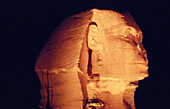 The Sphinx illuminated at night. Giza. Egypt