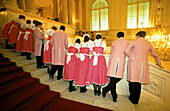 Waiters looking at arrivals, Emperor s ball, Vienna, Austria