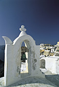 Small Bell tower in Ia village. Cyclades islands. Santorini. Greece