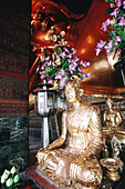 Small Buddha statue at Wat Pho temple. Bangkok. Thailand
