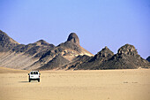 Sand and rocks landscape near Djanet oasis. Tassili n Ajjer area, Sahara desert. Algeria