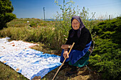 Peasant woman selling handicraft, Cape Kaliakra, Bulgaria