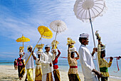 Purification ceremony hold on a Nusa Dua beach nearby touristic hotels. Bali island. Indonesia