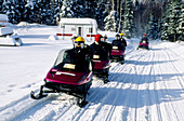 Snowmobile near Lac Saint Jean in winter. Quebec. Canada