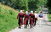 Amish girls walking. Pennsylvania, USA