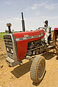 Tractor near Atbarah, Bayyudah Desert. Upper Nubia, ash-Shamaliyah state, Sudan
