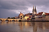 Steinerne Brücke (Stone Bridge). Cathedral in background. Regensburg. Bavaria. Germany