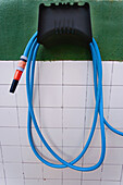  Blue, Color, Colour, Concept, Concepts, Daytime, Detail, Details, Exterior, Hang, Hanging, Hose, Hoses, Outdoor, Outdoors, Outside, Plastic, Wall, Walls, Water, D56-515265, agefotostock 