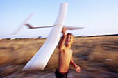  Action, Activity, Amusement, Blurred, Boy, Boys, Child, Childhood, Children, Children only, Color, Colour, Contemporary, Country, Countryside, Daytime, Exterior, Fun, Glider, Gliders, Holiday, Holidays, Horizontal, Human, Infantile, Kid, Kids, Leisure, M