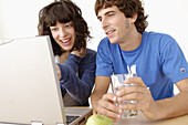 Girl and boy with laptop
