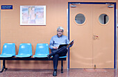 Patient in waiting room of hospital