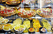 Italian typical food: pasta and pizza. Florence. Tuscany, Italy