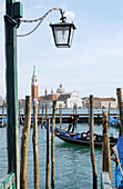 Gondolas and San Giorgio Maggiore church in background. Venice. Veneto, Italy