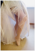  Adult, Adults, Barefeet, Barefoot, Bride, Brides, Carnal, Carnality, Color, Colour, Contemporary, Daytime, Dress, Dresses, Female, Human, Indoor, Indoors, Interior, Leg, Legs, Lingerie, One, One person, People, Person, Persons, Posture, Postures, Sensual