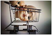  Alienated, Alienation, Capitalism, Color, Colour, Concept, Concepts, Consumption, Doll, Dolls, Head, Heads, Idea, Ideas, Indoor, Indoors, Interior, Isolated, Isolation, Morbid, Negative, Negative concept, Object, Objects, Odd, Shopping cart, Shopping car