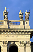 Detail of 15 giant statues that top the main facade (built 1732), St. John Lateran basilica. Rome. Italy