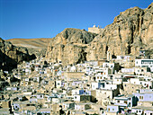 Maalula village with the Catholic monastery of Mar Sarkis (St. Sergius) on top of hill. Syria