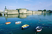 Old town ramparts on sea in background. Concarneau. Finistere. Brittany. France