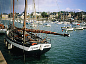 Old and modern boats moored in the harbour. Pleneuf. Cotes d Armor. Brittany. France