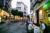 Outdoor restaurants at Santa Cruz quarter. Sevilla. Spain