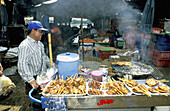 Kebab seller. Chatuchak Sunday Market. Bangkok. Thailand