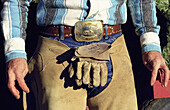 Close up of cowboy working costume. Kayenta. Arizona, USA