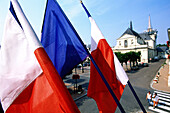 French flags on the City Hall, National Day. Richelieu. Touraine (Indre-et-Loire). France